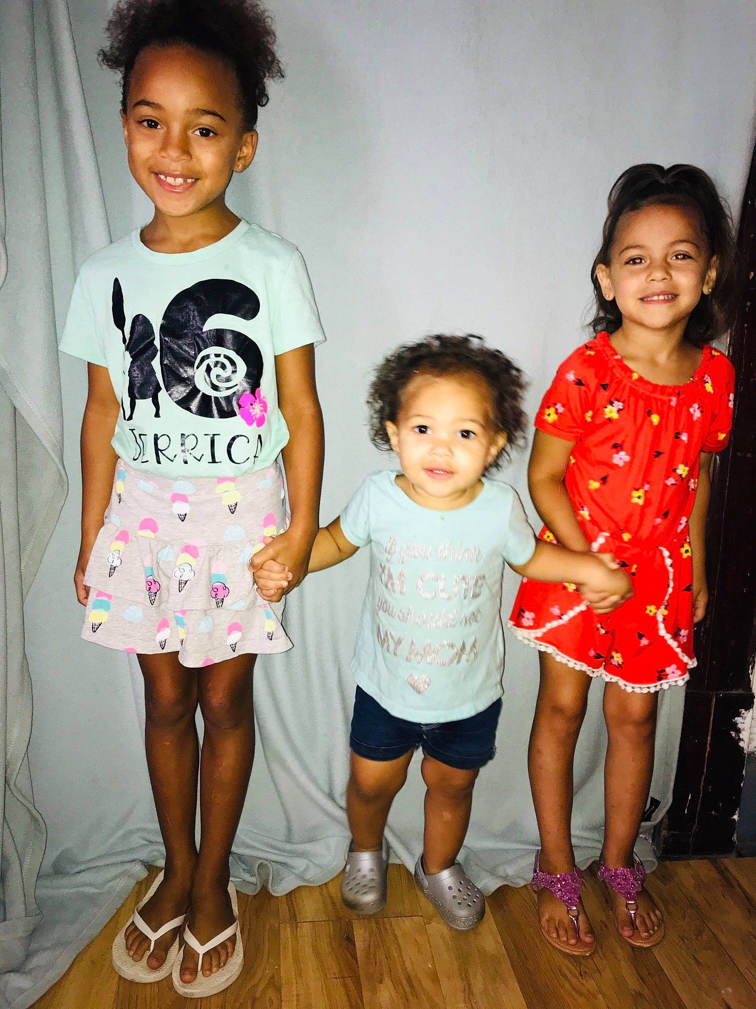 Athena is registered to the contest to win money with this photo: child, dress, family, joy, person, sibling, standing, t_shirt, toddler