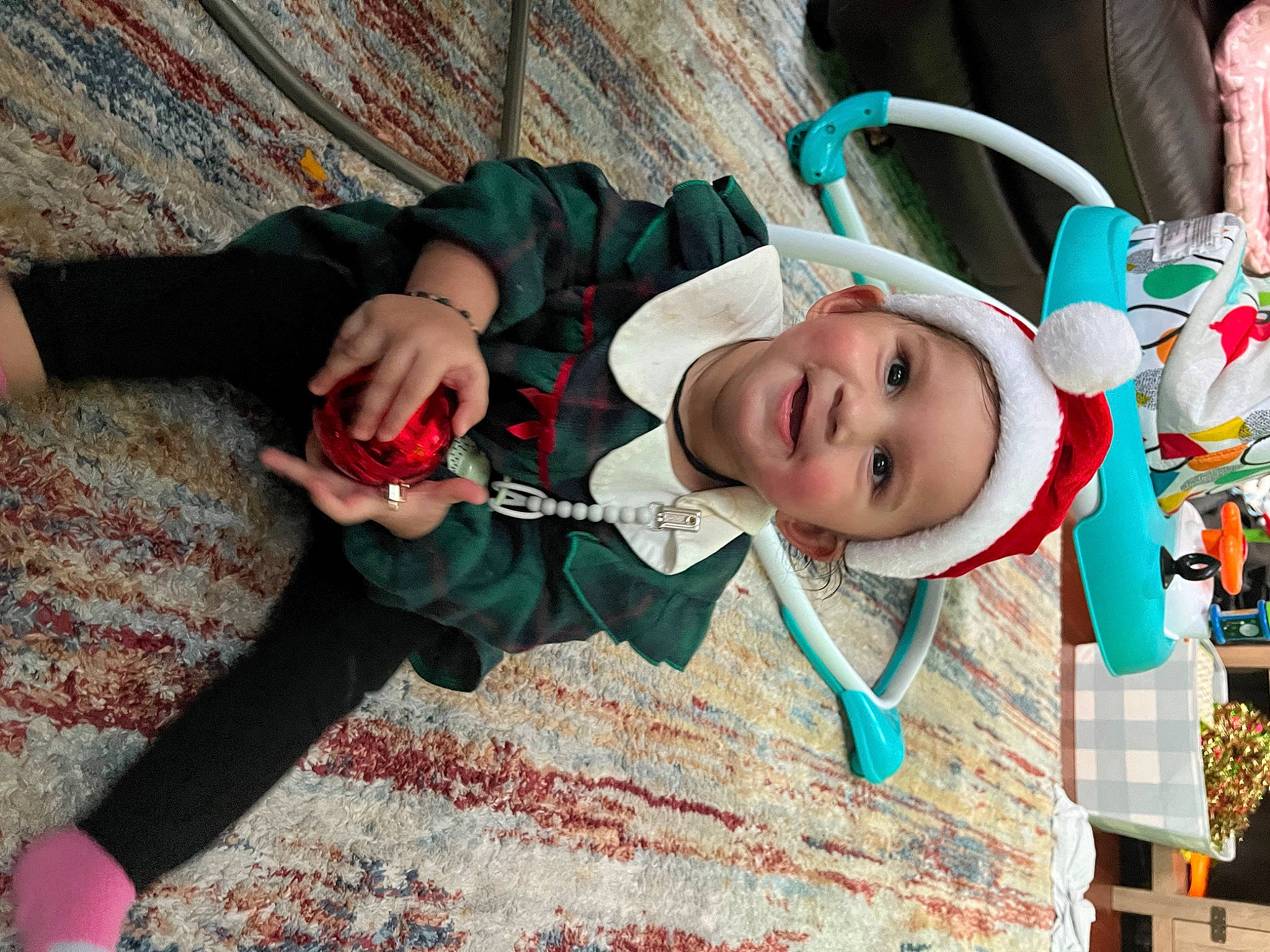 Mia joined the competition — help win amazing prizes! baby, baby_products, baby_toddler_clothing, child, costume, event, fun, happy, hat, headwear, joy, leisure, pattern, person, sitting, smile, toddler, tradition, tree, vacation