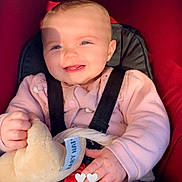 Noellya participe au concours pour gagner de l'argent avec cette photo : baby, infant, car_seat, stroller, seat_belt, harness, plush_toy, smile, happy, rosy_cheeks, blue_eyes, pink_clothing, hand, fingers, blanket, sunlight, shadow, red_upholstery, portrait, cute