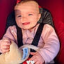 baby, infant, car_seat, stroller, seat_belt, harness, plush_toy, smile, happy, rosy_cheeks, blue_eyes, pink_clothing, hand, fingers, blanket, sunlight, shadow, red_upholstery, portrait, cute