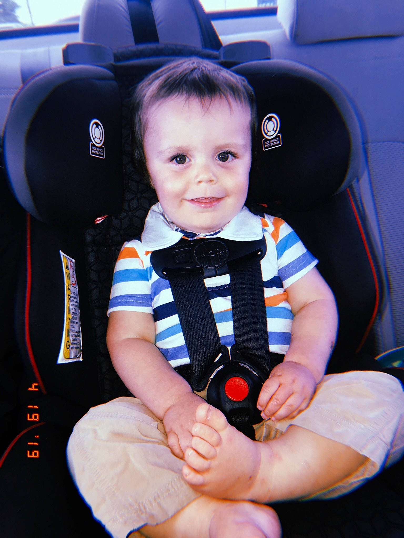 Chandler is registered to the contest to win money with this photo: auto_part, baby_in_car_seat, baby_products, car_seat, car_seat_cover, child, joy, person, product, seat_belt, toddler