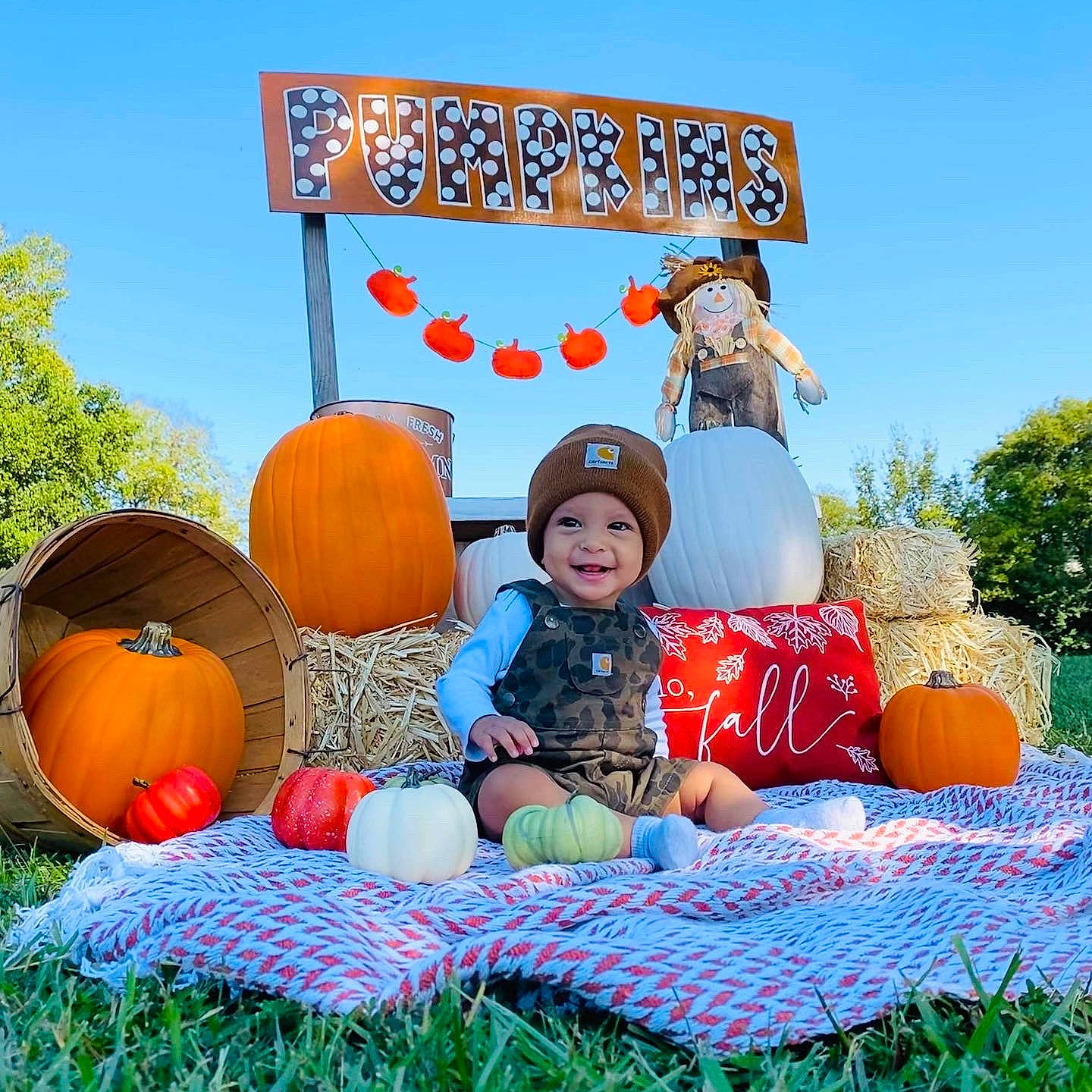River joined the competition — help win amazing prizes! calabaza, cucurbita, event, fun, gourd, grass, happy, hat, headwear, joy, leisure, natural_foods, people_in_nature, person, plant, pumpkin, recreation, sky, smile, toddler