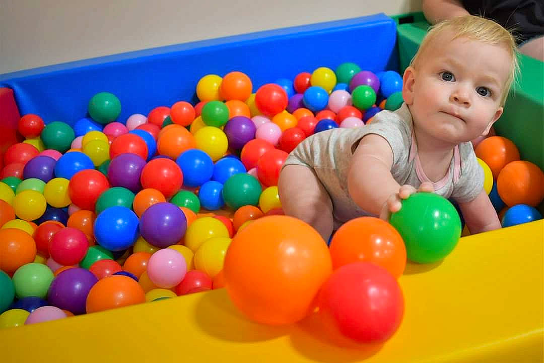 Felicity is registered to the contest to win money with this photo: baby, baby_playing_with_toys, baby_products, baby_toys, ball, ball_pit, child, fun, human_settlement, leisure, mixture, party, person, plastic, play, playground, recreation, room, sweetness, toddler
