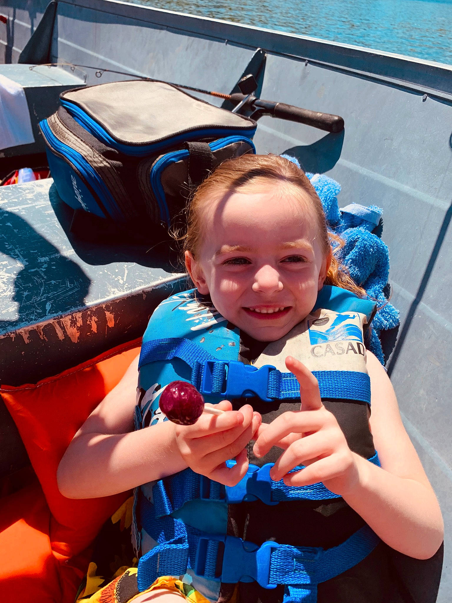 Addilynn is registered to the contest to win money with this photo: azure, blue, boats_and_boating_equipment_and_supplies, child, costume, electric_blue, event, fun, gesture, happy, joy, leisure, people, person, personal_protective_equipment, photograph, recreation, smile, snapshot, toddler