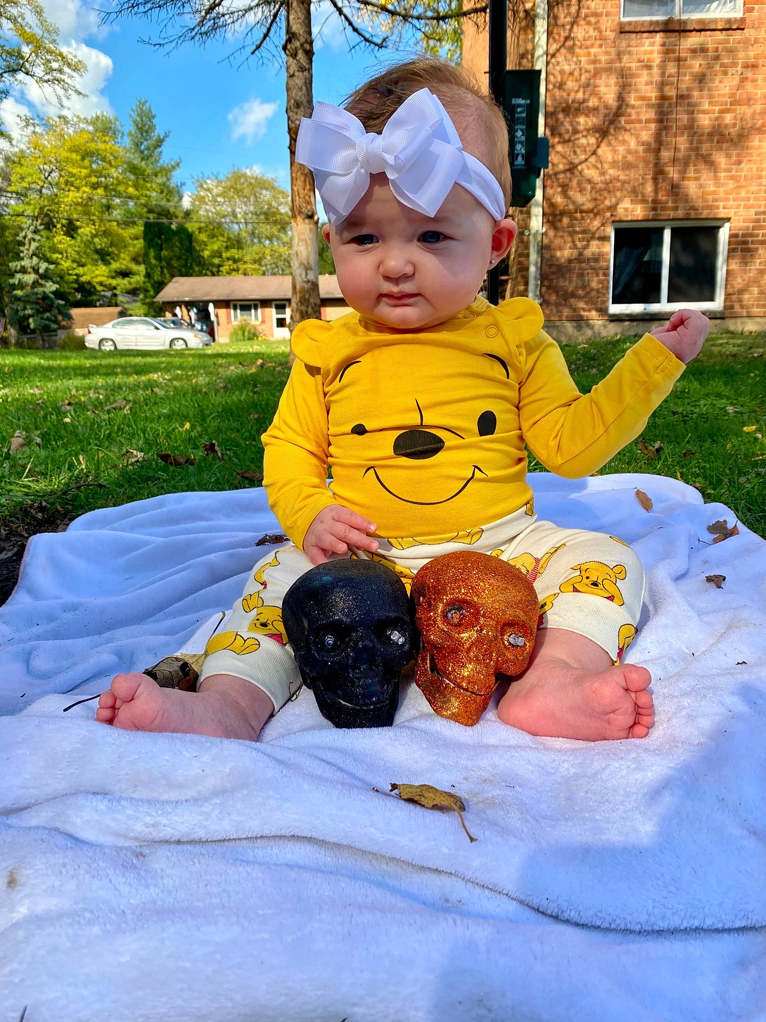 Khloe joined the competition — help win amazing prizes! baby_toddler_clothing, eye, face, fun, grass, happy, hat, head, headwear, human_body, jacket, lap, leisure, people, people_in_nature, person, plant, recreation, toddler, tree