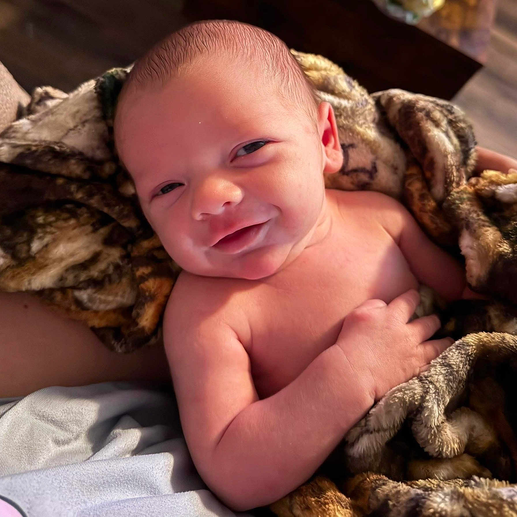 Tamen joined the competition — help win amazing prizes! baby, bed, blanket, closeup, couch, cozy, eyes, face, hand, head, human, indoors, infant, newborn, plush, portrait, resting, skin, smile, soft_lighting