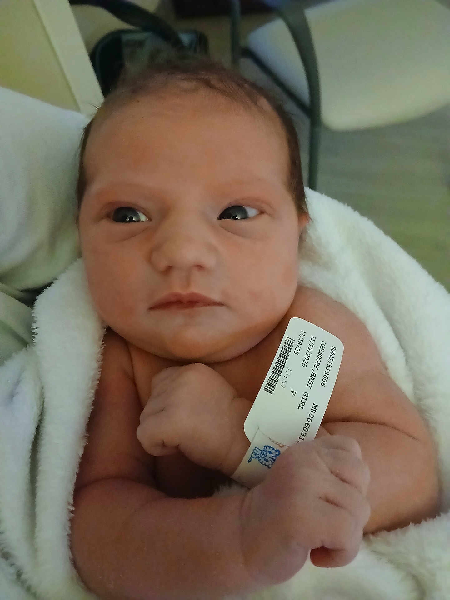 Elianna is registered to the contest to win money with this photo: newborn, baby, infant, blanket, hospital, wristband, skin, face, arms, curious, wrapped, soft, person, indoors, closeup, human, newlife, cute, small, child