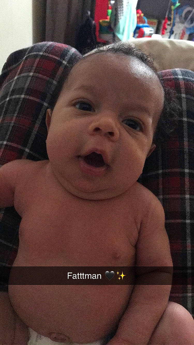 Wayne is registered to the contest to win money with this photo: cheek, chest, child, chin, dress_shirt, eyebrow, eyelash, forehead, iris, lip, muscle, neck, organ, pattern, person, plaid, skin, tartan, textile, toddler