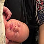 Isaiah Jr. is registered to the contest to win money with this photo: baby, sleeping, newborn, blanket, skin, hand, face, person, comfort, rest, peaceful, closeup, infant, cuddly, soft, human, relaxation, nap, adult, casual