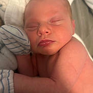 Isaiah is registered to the contest to win money with this photo: baby, newborn, sleeping, mittens, blanket, skin, face, infant, cute, peaceful, closeup, soft, rest, toddler, person, child, nap, warm, cozy, portrait