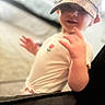 Bria joined the competition — help win amazing prizes! blurred_background, cap, child, clothing, cute, expression, face, hand, hat, indoor, light, person, playful, portrait, rose_embroidery, skin, soft_focus, toddler, white_shirt, young_child