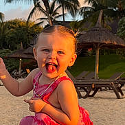 Love participe au concours pour gagner de l'argent avec cette photo : beach, casual_clothing, child, happy, holiday, laughing, nature, necklace, outdoor, palm_trees, pink_outfit, playful, portrait, sand, smile, summer, sunlight, sunset, toddler, vacation