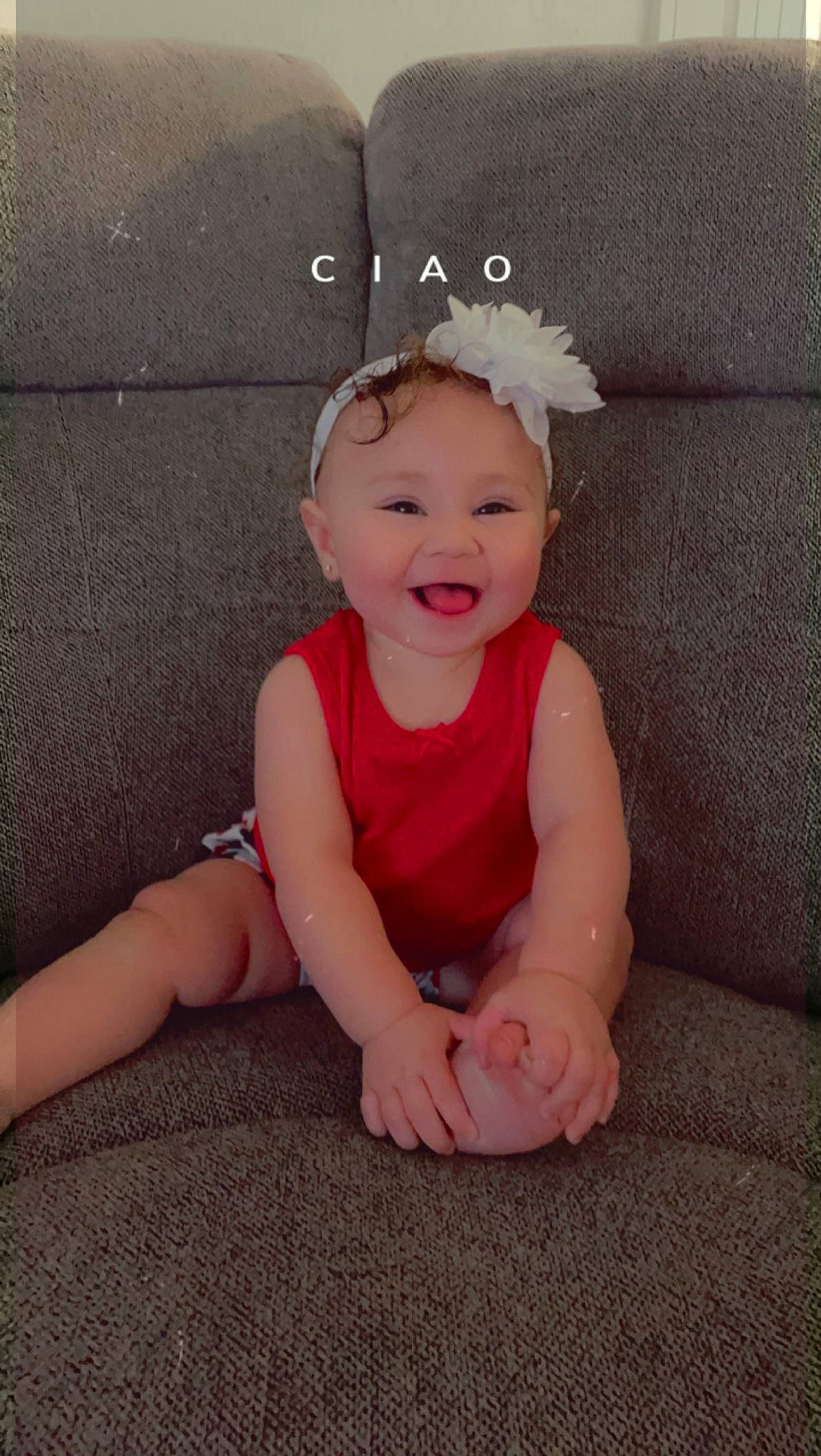 Gia joined the competition — help win amazing prizes! baby, baby_toddler_clothing, costume_hat, face, fashion_accessory, flash_photography, flooring, fun, happy, head, headband, headpiece, jewellery, magenta, person, pink, sitting, skin, sleeve, smile