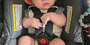 Frederick joined the competition — help win amazing prizes! baby, infant, car_seat, shark_hoodie, clothing, child, cute, sitting, seatbelt, indoors, person, headwear, looking, chubby_legs, hood, expression, safety, straps, foot, hand