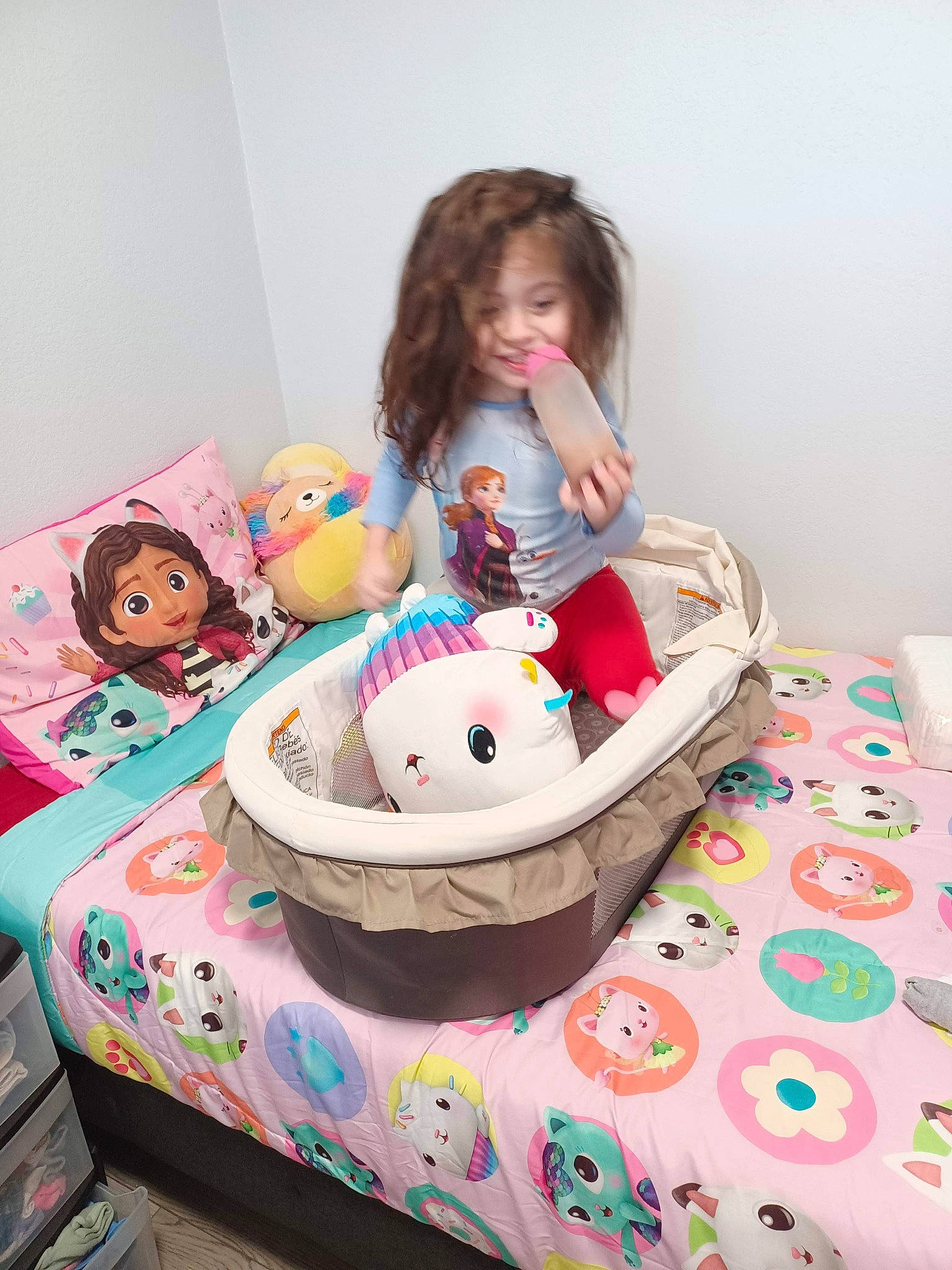Sariyah joined the competition — help win amazing prizes! baby_products, baby_toddler_clothing, bag, bed, bedding, child, comfort, doll, event, fun, joy, leisure, linens, pattern, person, pink, play, recreation, sitting, stuffed_toy