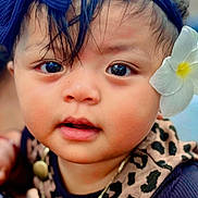 Hope is registered to the contest to win money with this photo: accessory, baby, bow, child, closeup, clothing, cute, expression, eyes, face, flower, hand, headband, infant, leopard_print, necklace, person, portrait, skin, young