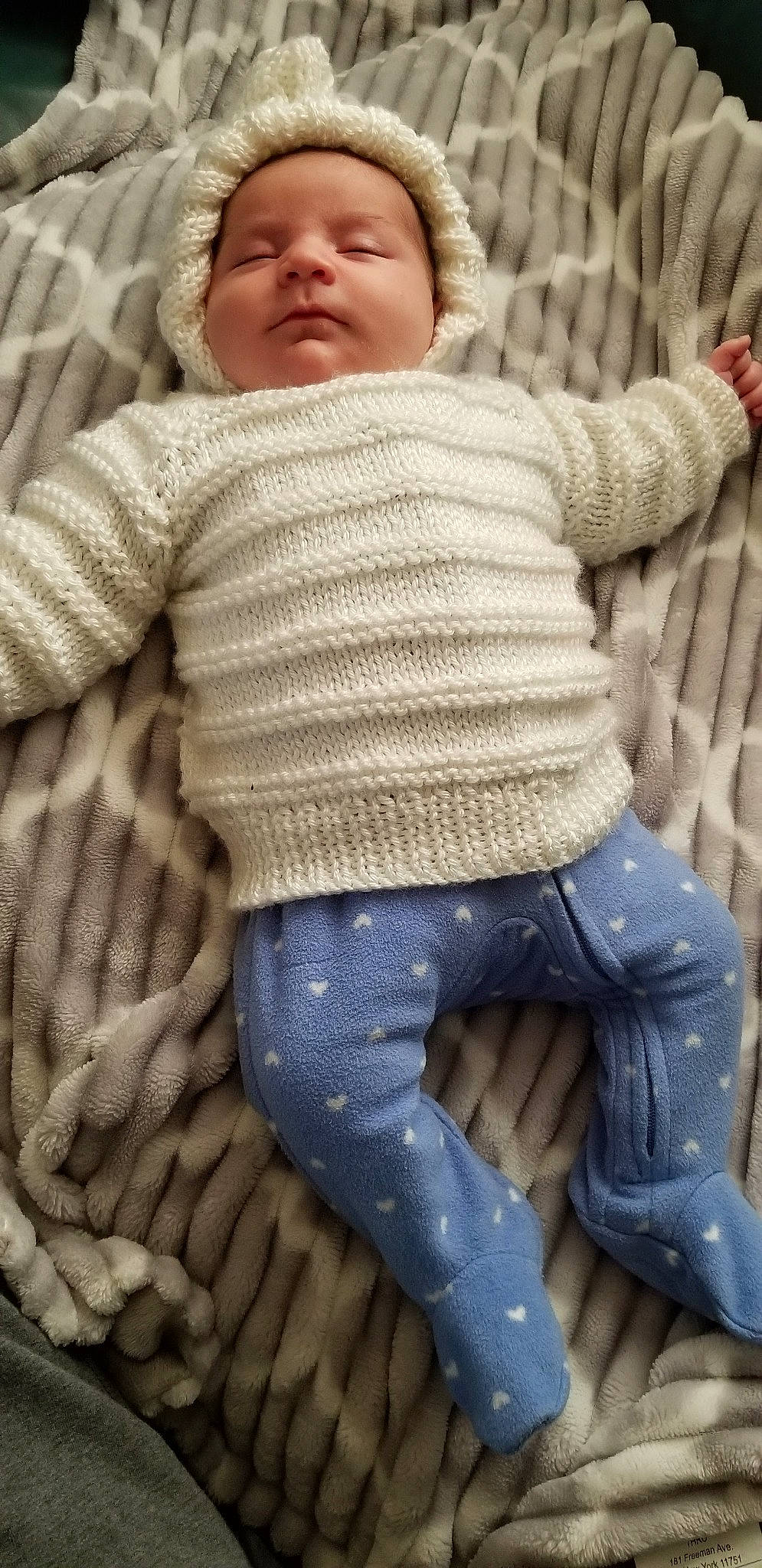 Carmella joined the competition — help win amazing prizes! baby, child, headwear, jeans, knitting, outerwear, person, sleeve, smile, sweater, toddler, wool