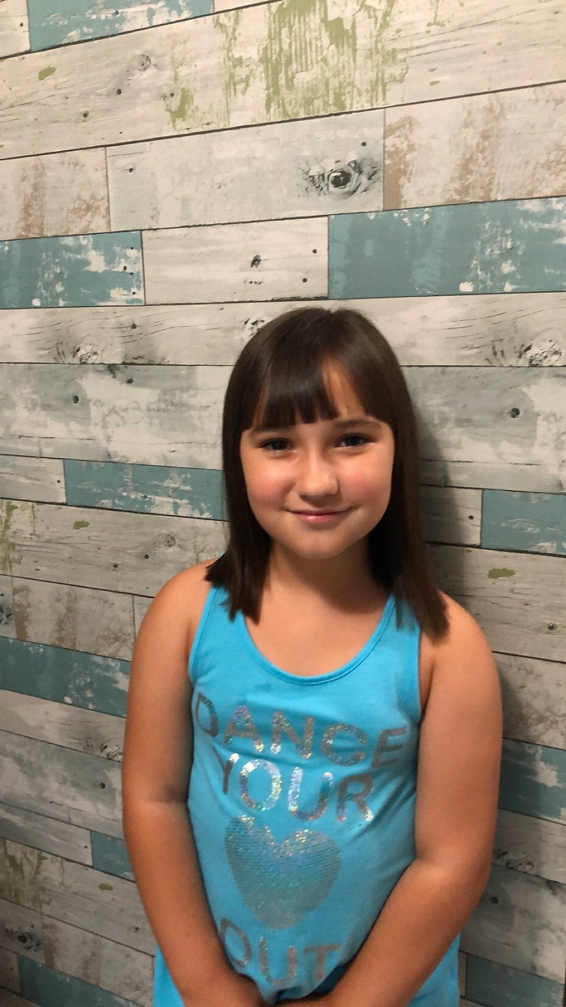 Gabriella is registered to the contest to win money with this photo: aqua, azure, black_hair, chin, cool, facial_expression, flash_photography, hair, hairstyle, happy, head, joy, mouth, organ, people_in_nature, person, pink, skin, smile, standing