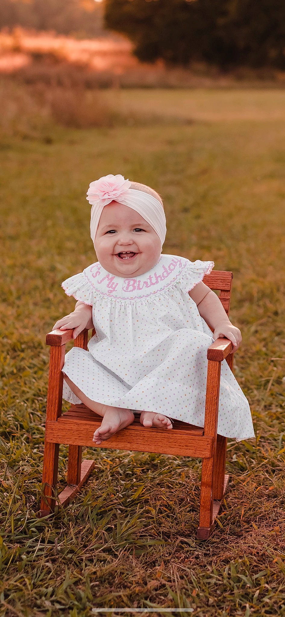 Palmer joined the competition — help win amazing prizes! baby, baby_toddler_clothing, chair, dress, face, flash_photography, grass, hand, happy, hat, head, headwear, human_body, joy, people_in_nature, person, pink, plant, skin, smile