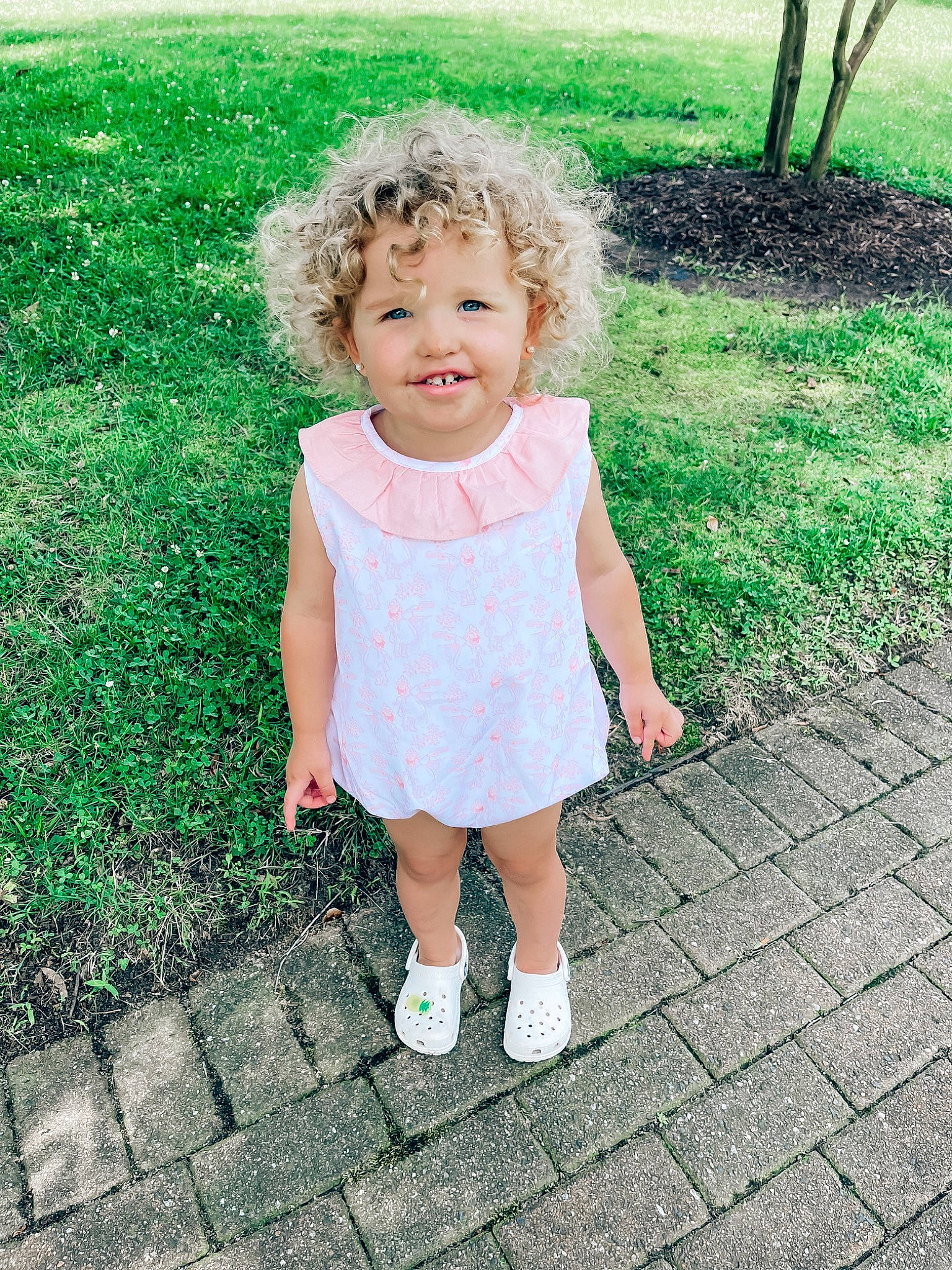Sloane joined the competition — help win amazing prizes! baby, baby_toddler_clothing, child, day_dress, face, footwear, fun, grass, green, happy, joy, one_piece_garment, pattern, people_in_nature, person, plant, portrait_photography, sandal, sleeve, tints_and_shades
