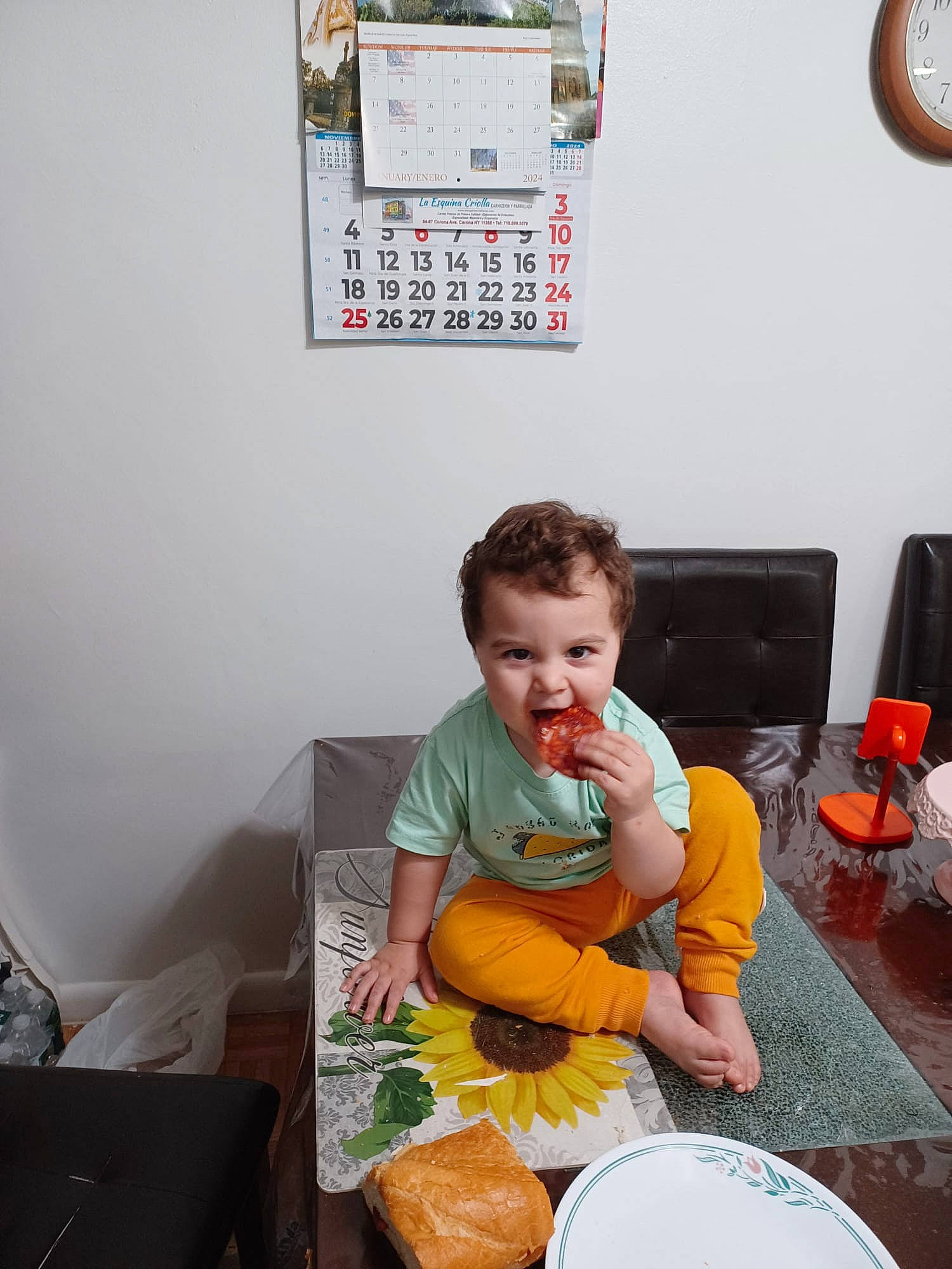 Antonio joined the competition — help win amazing prizes! baby, chair, child, clock, couch, drum, fun, happy, home_appliance, houseplant, lap, membranophone, musical_instrument, orange, person, picture_frame, plate, room, sitting, t_shirt