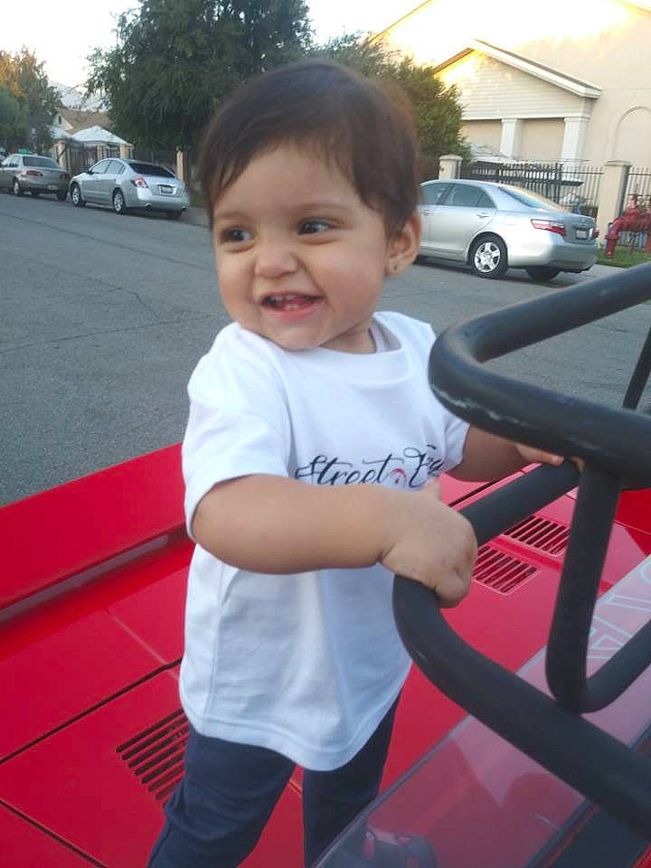 Miranda joined the competition — help win amazing prizes! baby, car, child, fun, leg, leisure, person, play, skin, smile, toddler, vacation, vehicle