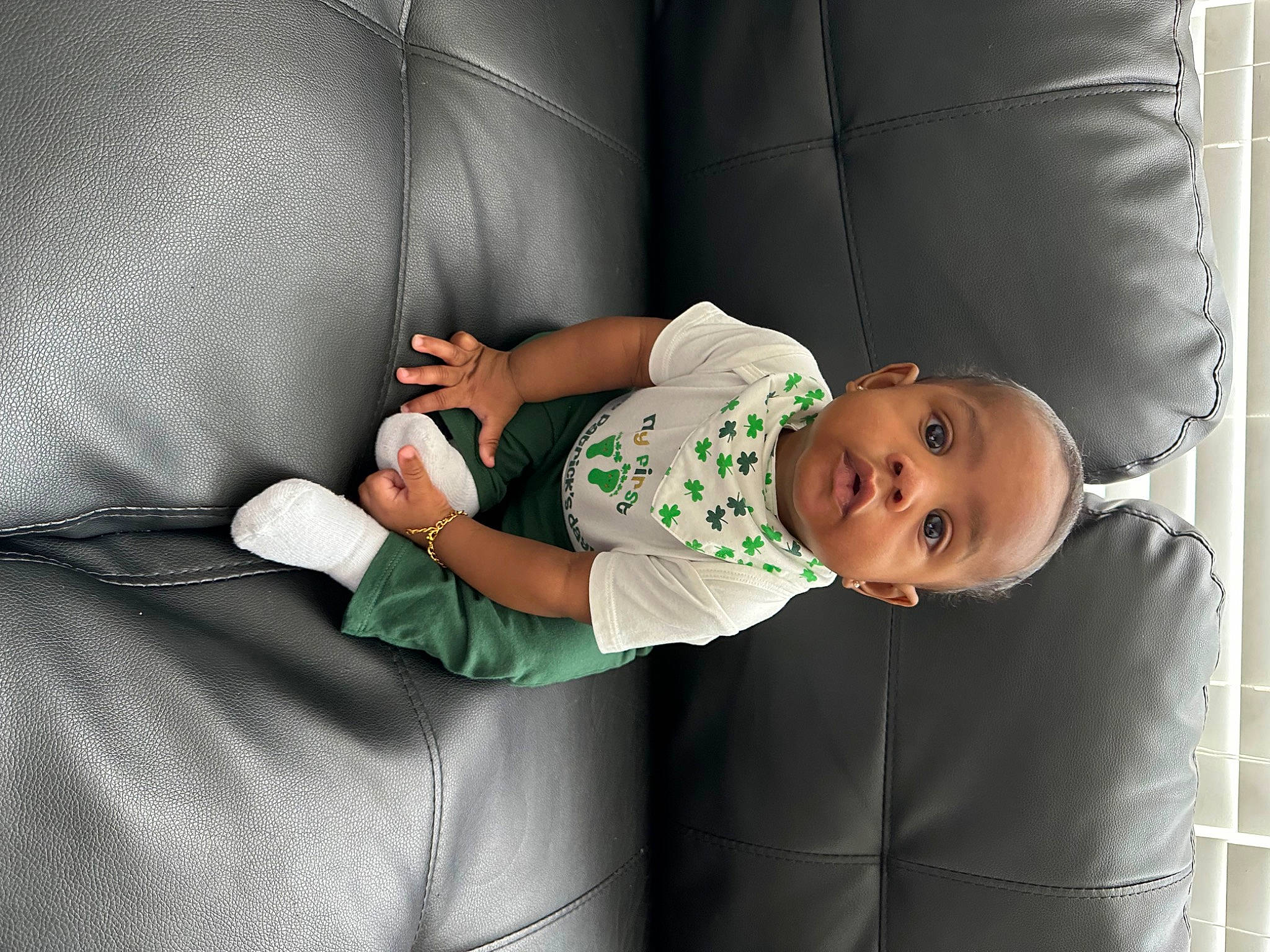 Kason is registered to the contest to win money with this photo: baby, baby_products, baby_safety, baby_sleeping, baby_toddler_clothing, child, comfort, couch, elbow, finger, flash_photography, human_leg, knee, linens, person, room, sitting, sleeve, sock, thigh