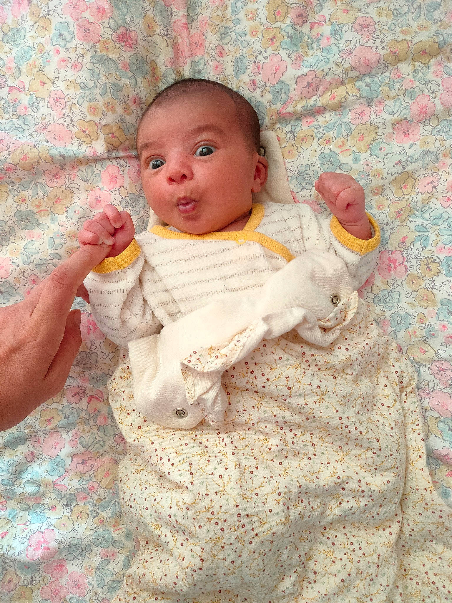 Charlie Rose participe au concours pour gagner de l'argent avec cette photo : baby, baby_products, baby_toddler_clothing, cheek, child, comfort, doll, dress, flooring, fur, happy, iris, linens, peach, person, pink, sitting, skin, sleeve, surprise