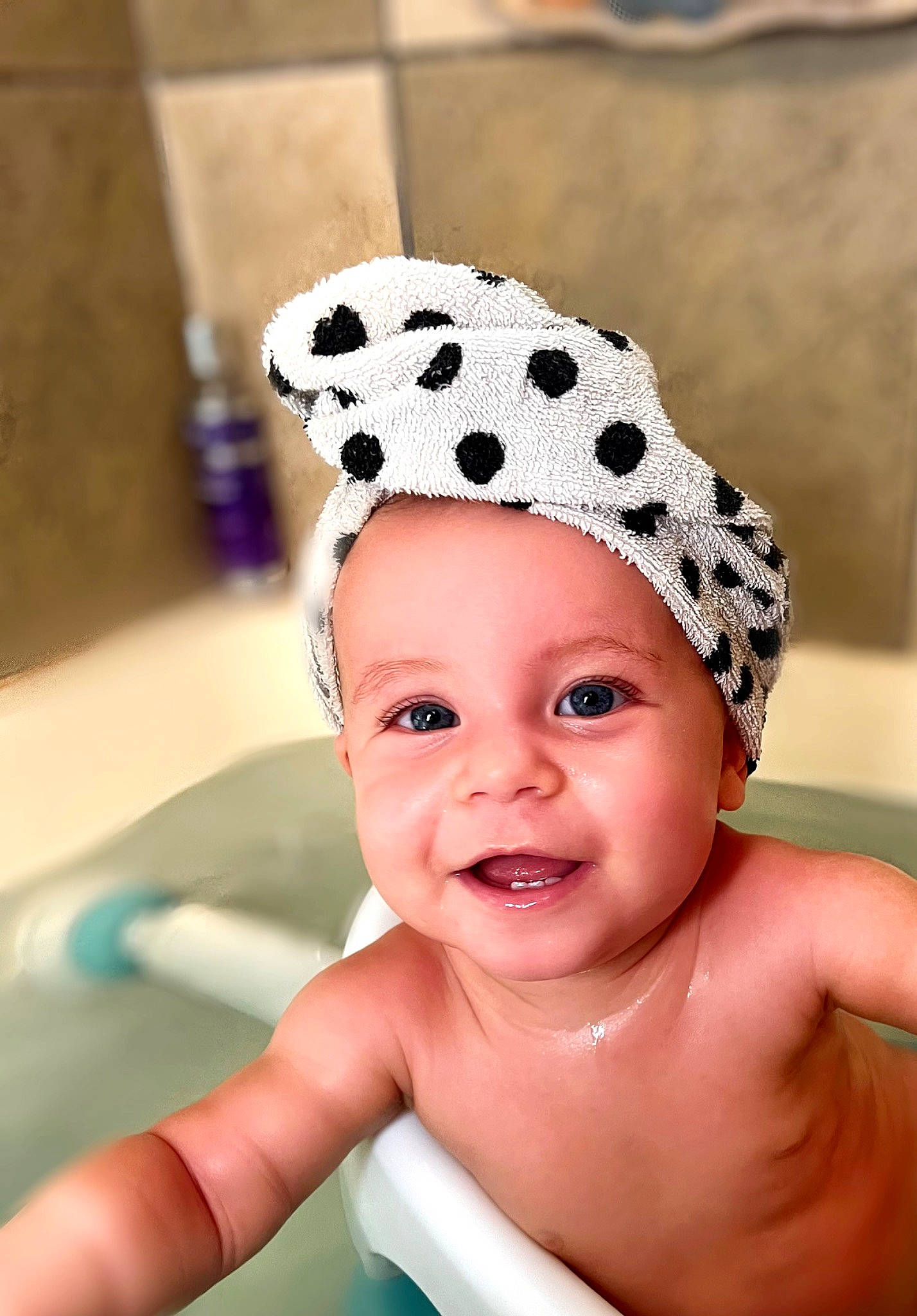 Scarlett is registered to the contest to win money with this photo: baby, baby_products, baby_toddler_clothing, bathing, cap, child, costume_hat, eyelash, fashion_accessory, finger, hair_accessory, happy, headband, headpiece, headwear, jewellery, joy, party_supply, pattern, person