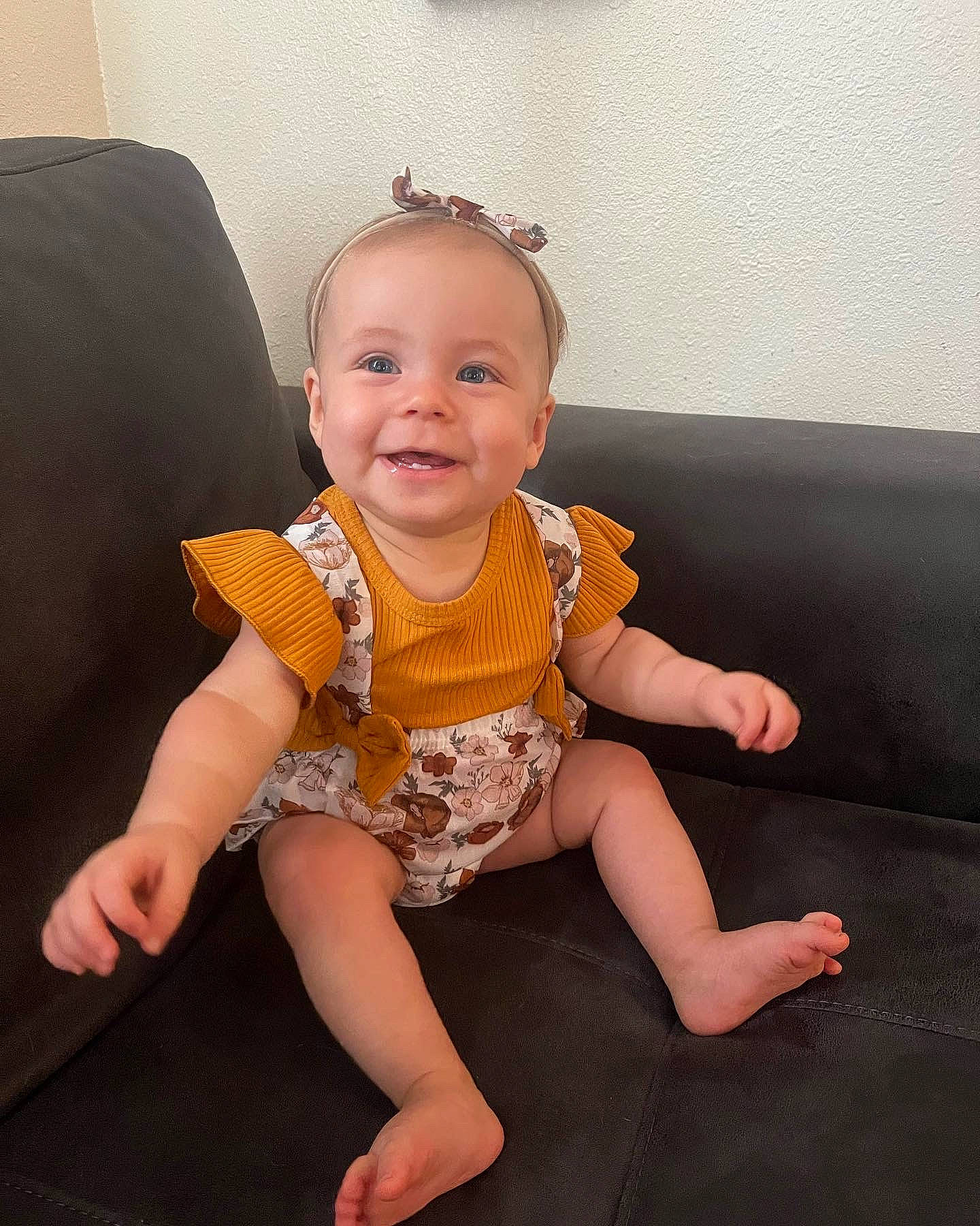 Scarlett joined the competition — help win amazing prizes! arm, baby_toddler_clothing, cheek, couch, dress, eye, face, facial_expression, finger, head, human_body, iris, joint, joy, mammal, neck, person, product, shoulder, skin