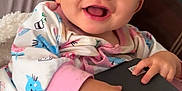 Imoni joined the competition — help win amazing prizes! baby, child, smiling, pajamas, keyboard, laptop, hands, indoor, cushions, happy, cute, face, person, technology, playing, closeup, infant, cozy, home, expression