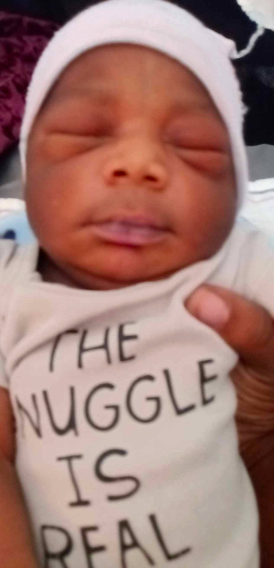 Kailyn is registered to the contest to win money with this photo: baby, cheek, chin, eyebrow, eyelash, forehead, gesture, happy, head, headwear, jaw, lip, mouth, muscle, neck, nose, organ, person, skin, sleeve