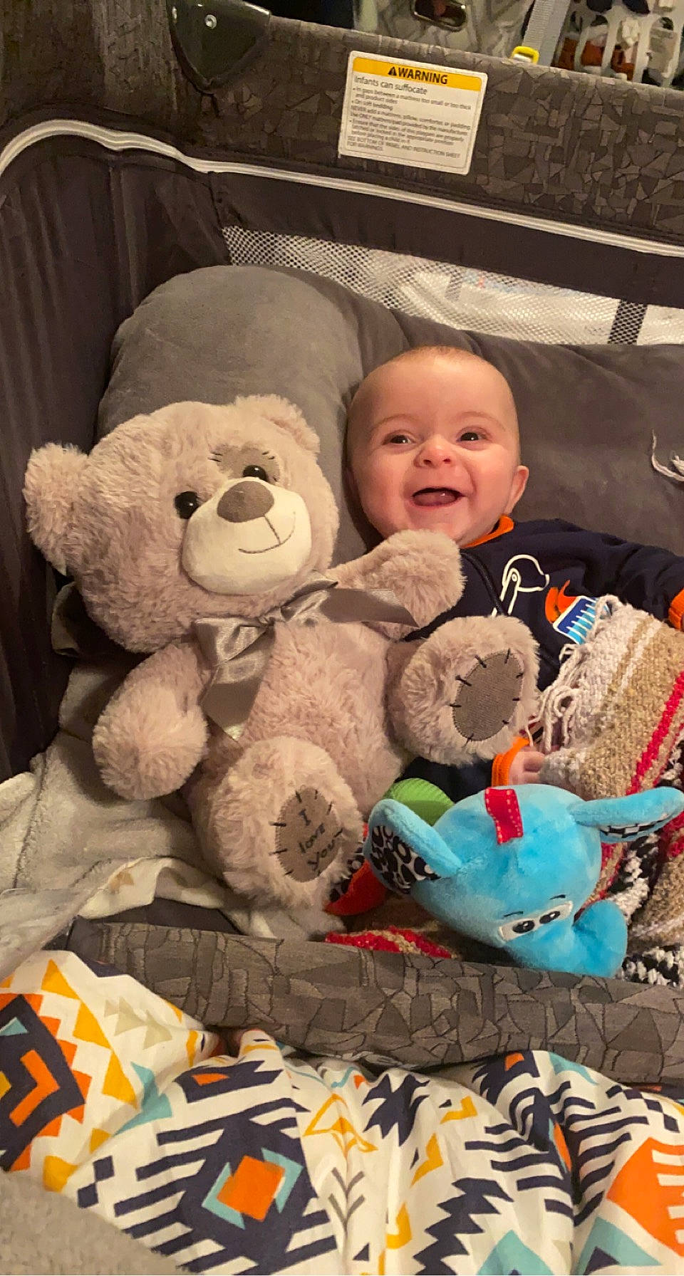 Coleson joined the competition — help win amazing prizes! baby, baby_toys, blue, cheek, child, comfort, happy, linens, organ, people, person, plush, room, skin, smile, stuffed_toy, teddy_bear, textile, toddler, toy