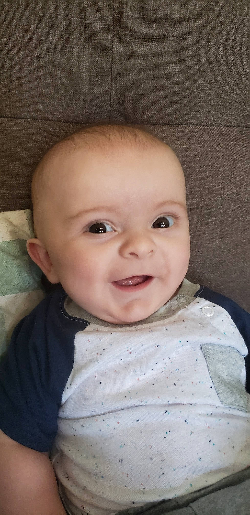 Coleson is registered to the contest to win money with this photo: baby, baby_toddler_clothing, cheek, child, chin, comfort, eye, eyebrow, eyelash, flash_photography, happy, head, iris, lip, nose, person, skin, sleeve, smile, toddler