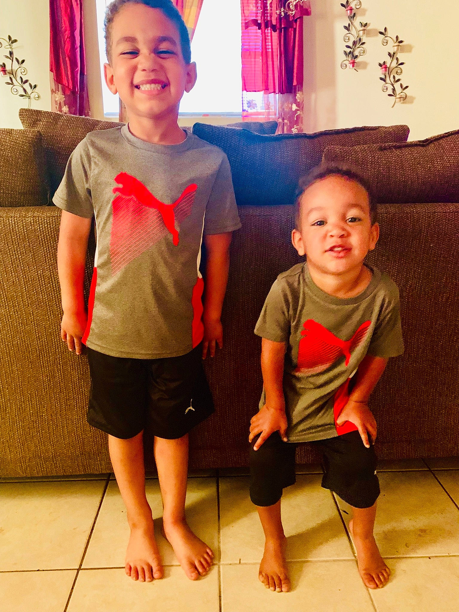 Tyrone Marshall Jr joined the competition — help win amazing prizes! barefoot, child, face, floor, flooring, fun, happy, head, joint, joy, leg, people, person, room, shoulder, skin, smile, standing, summer, t_shirt