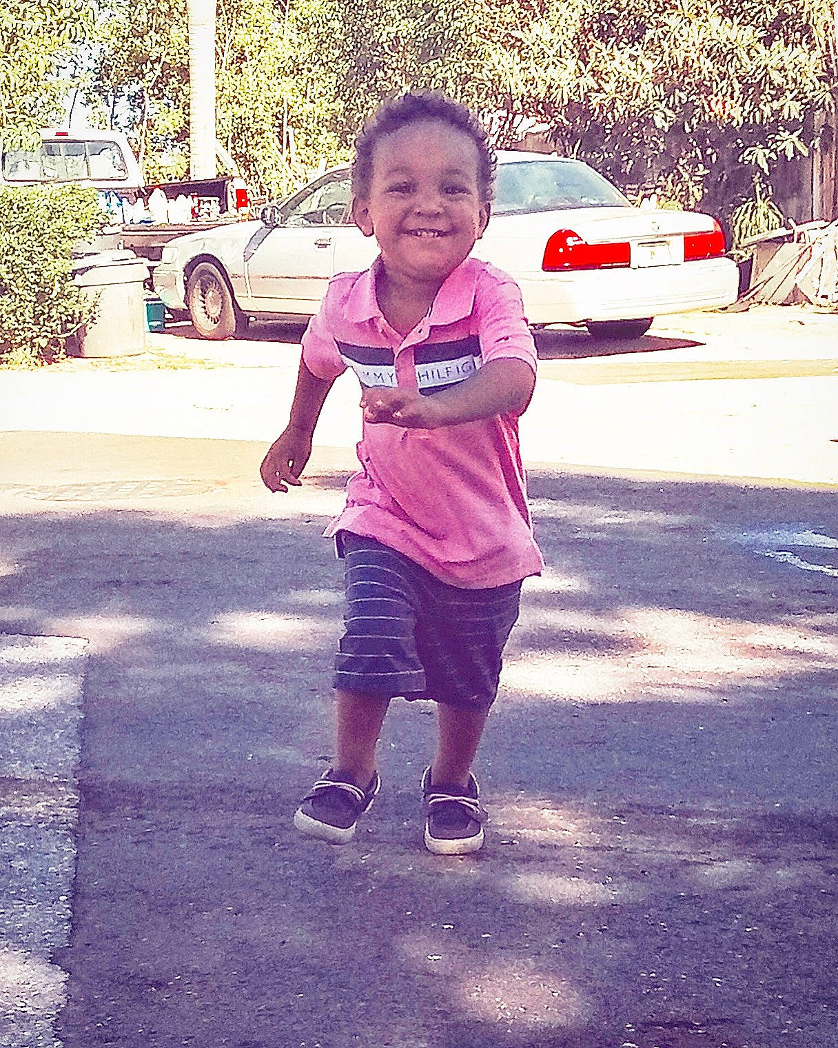 Tyree Marshall is registered to the contest to win money with this photo: car, child, face, family_car, fun, happy, head, joy, morning, people, person, plant, play, sky, smile, snapshot, standing, summer, toddler, tree