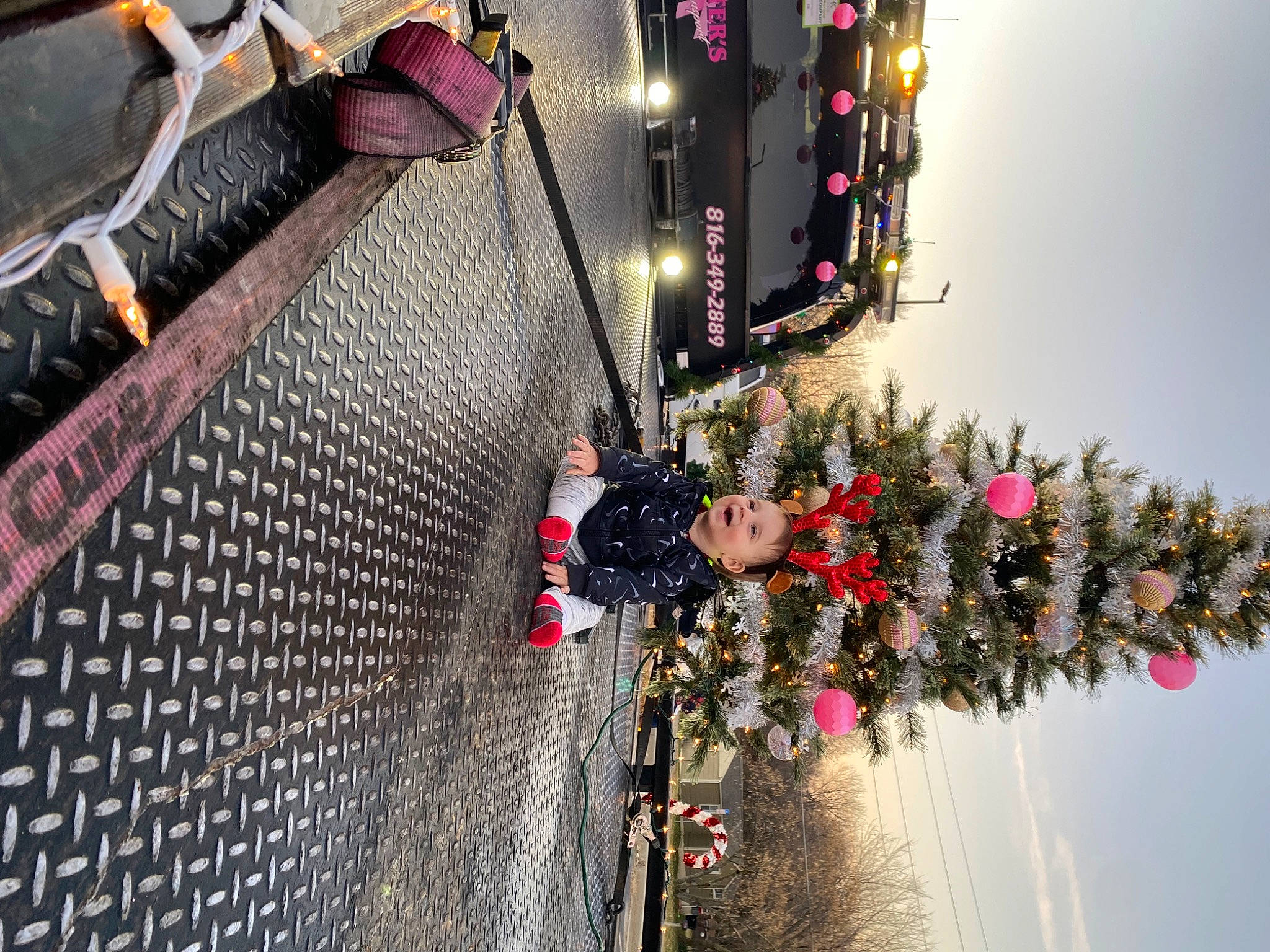 Braxton joined the competition — help win amazing prizes! building, city, event, facade, fun, leisure, lighting, line, magenta, pedestrian, person, plant, road, sidewalk, sky, street, street_light, tradition, travel, tree