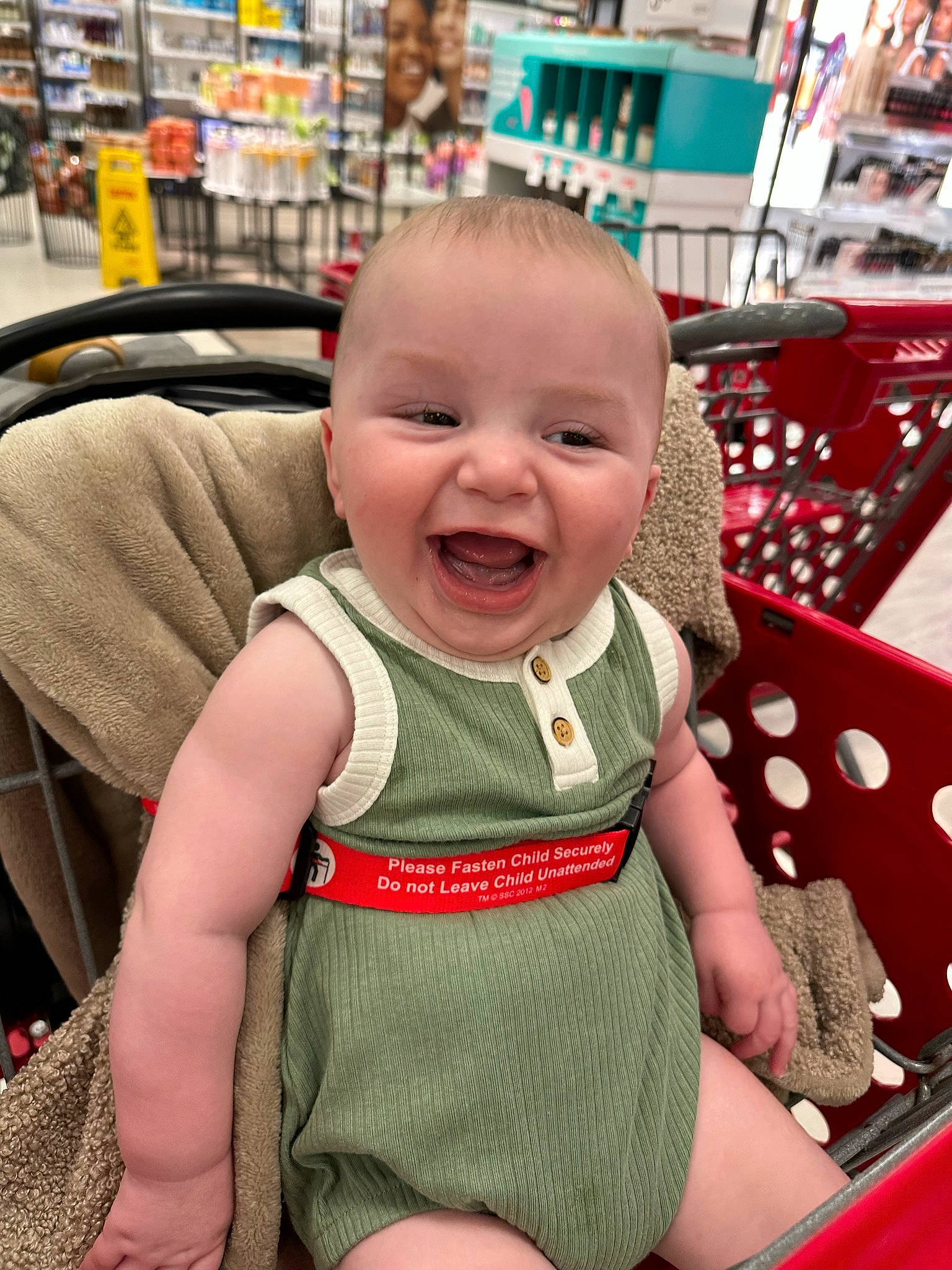 Arthur is registered to the contest to win money with this photo: baby, baby_products, baby_toddler_clothing, cheek, child, customer, eye, fun, happy, pattern, person, photograph, product, retail, sitting, skin, sleeve, smile, snapshot, toddler