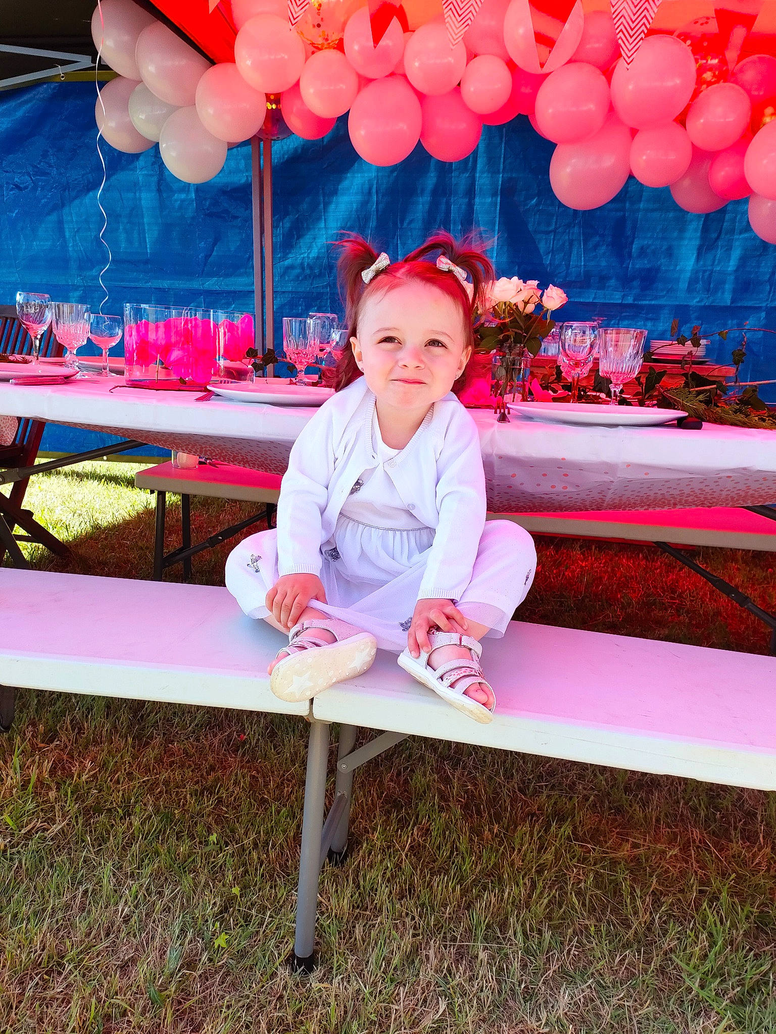 Rose participe au concours pour gagner de l'argent avec cette photo : baby_toddler_clothing, balloon, bench, child, event, eye, fun, grass, happy, hat, joy, leisure, magenta, outdoor_furniture, person, pink, recreation, red, sitting, sleeve