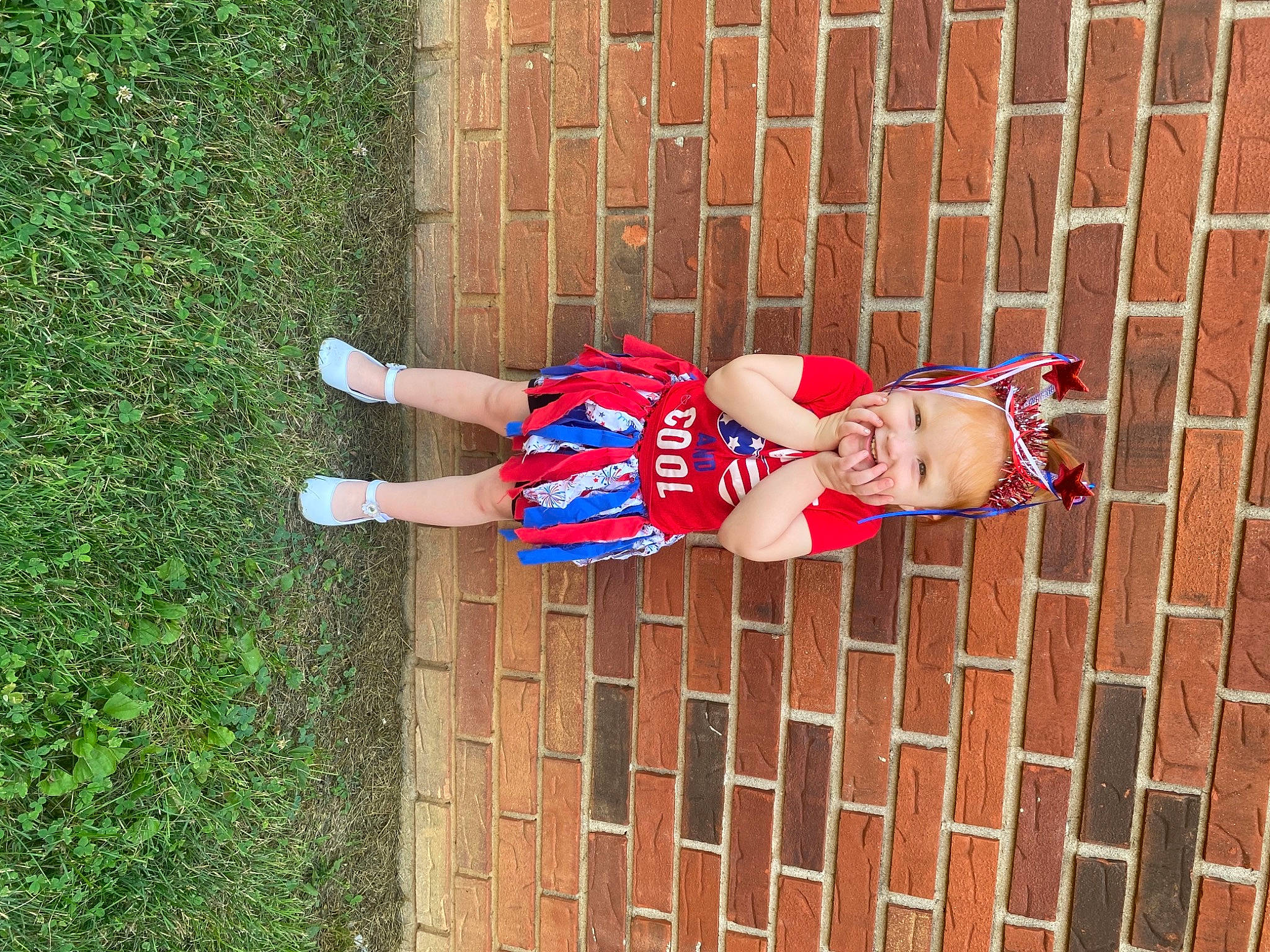 Camreigh joined the competition — help win amazing prizes! brick, brickwork, carmine, child, dress, electric_blue, grass, green, hat, human_leg, pattern, person, plant, smile, street_fashion, sunglasses, thigh, toddler, wood, wrist