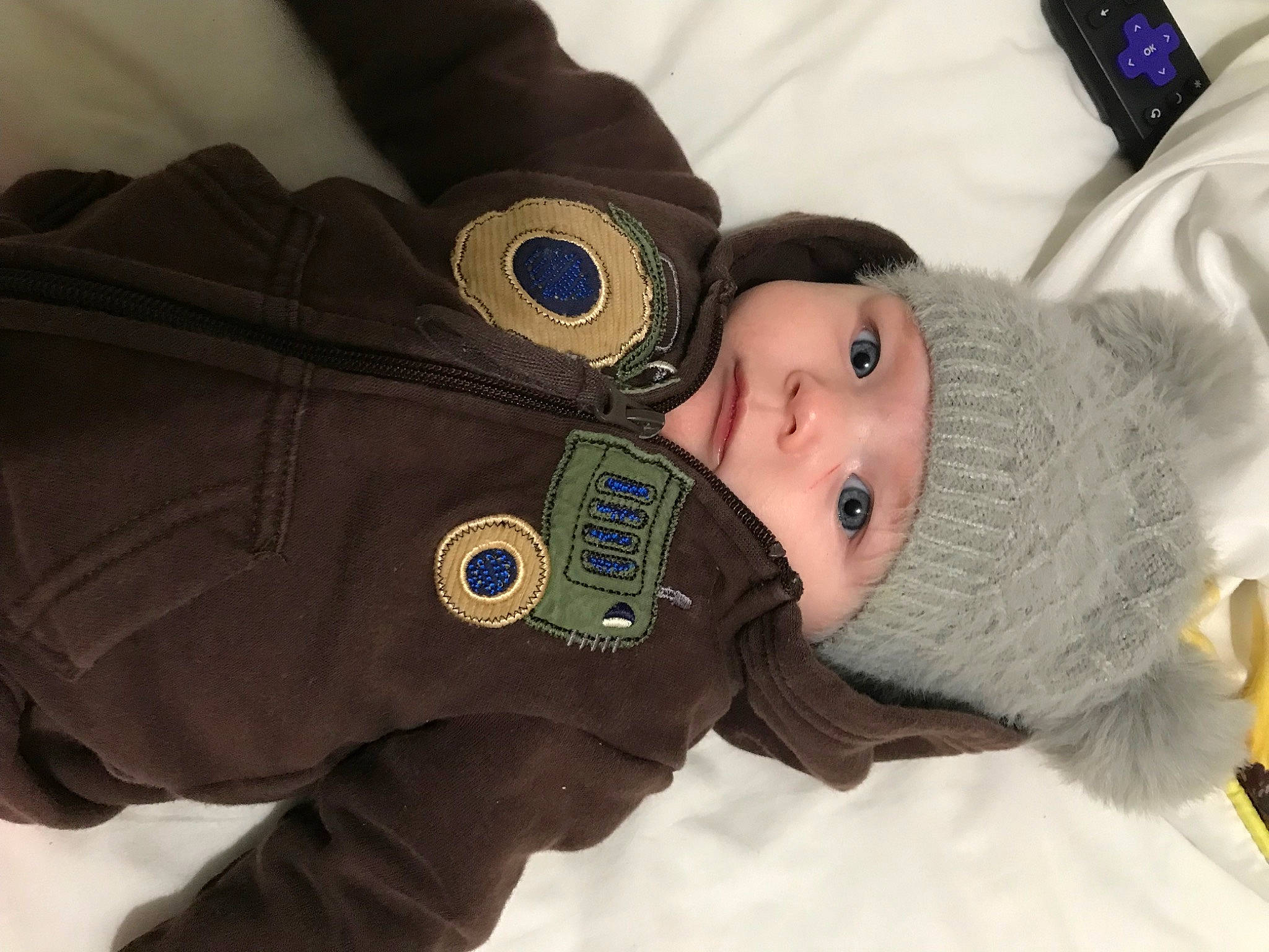 Harleigh is registered to the contest to win money with this photo: baby, baby_products, baby_toddler_clothing, cheek, child, comfort, event, eye, fur, gesture, happy, headwear, interaction, outerwear, person, product, skin, sleeve, toddler, winter