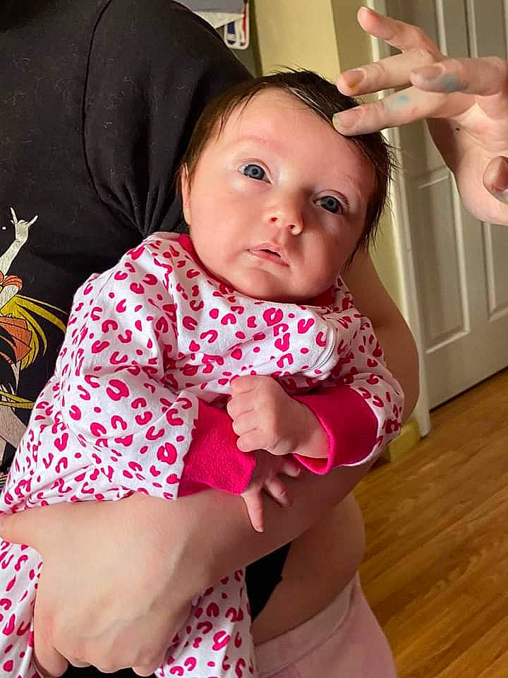 Holly joined the competition — help win amazing prizes! baby, baby_toddler_clothing, cheek, child, comfort, elbow, eyelash, finger, gesture, hand, happy, human_body, joint, lip, neck, person, pink, shoulder, skin, sleeve