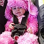baby, child, pink, costume, fluffy, car_seat, seatbelt, buckle, cute, portrait, indoor, infant, clothing, child_seat, safety, person, face, hands, plush, hood