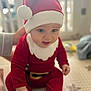 baby, blue_eyes, child, christmas, cozy, cute, festive, hand_support, holiday, holiday_costume, indoor, infant, mat, portrait, red_clothing, santa_hat, sitting, smiling, soft_focus, young_child