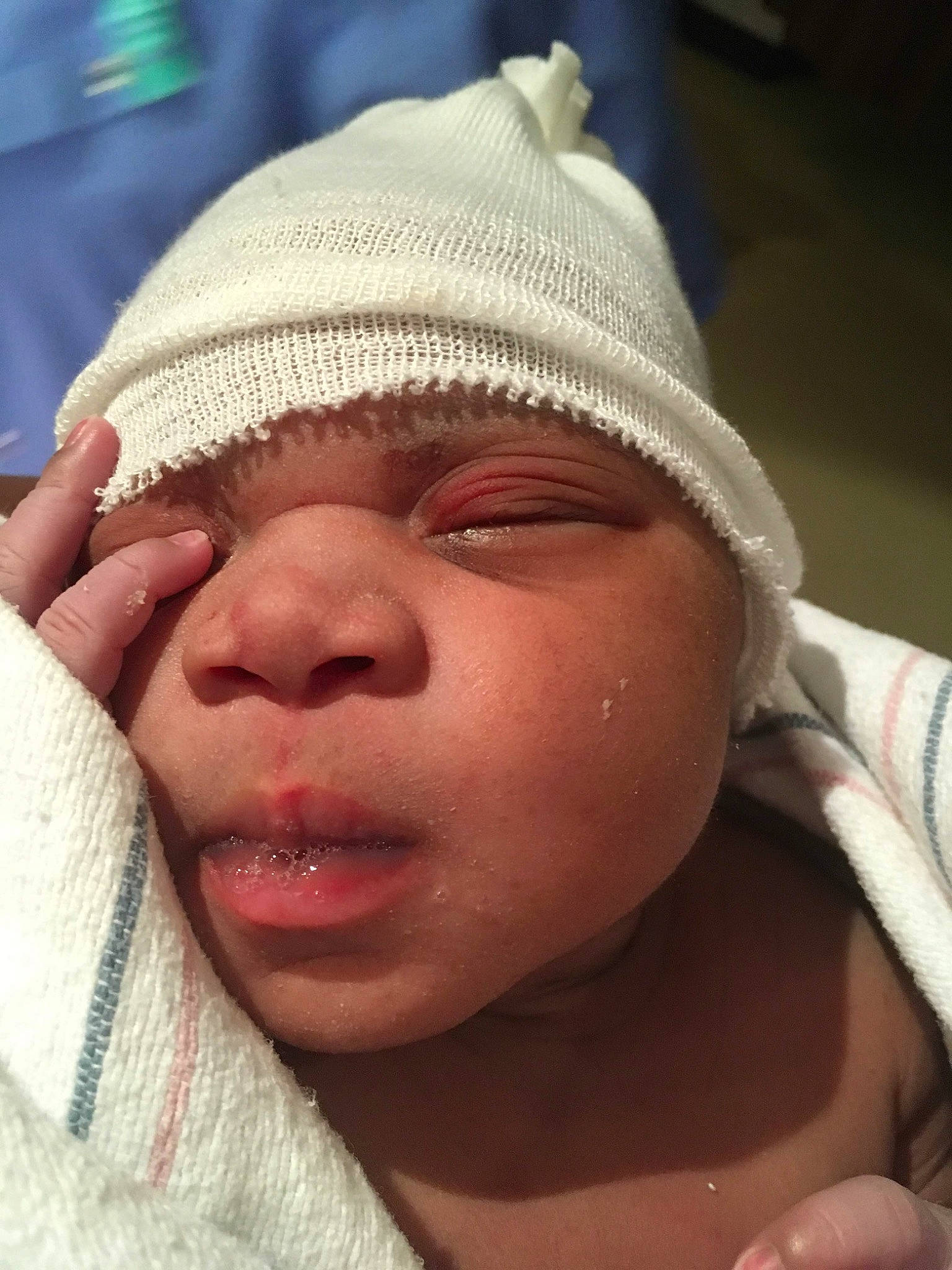 Royal is registered to the contest to win money with this photo: baby, cap, cheek, chin, comfort, eye, eyebrow, eyelash, forehead, fun, happy, headgear, headwear, human, lip, mouth, nose, person, skin, smile