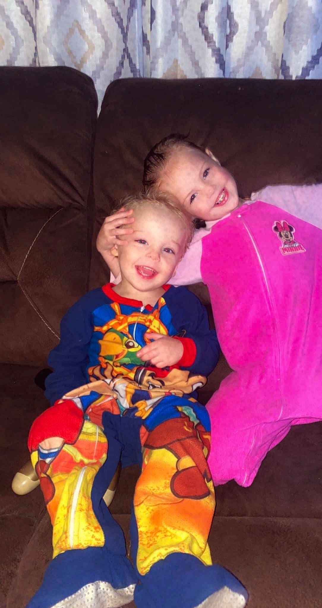 Adelaide is registered to the contest to win money with this photo: baby_toddler_clothing, child, comfort, costume, couch, electric_blue, event, eye, fictional_character, fun, fur, happy, head, human_body, joy, lap, person, play, sitting, smile