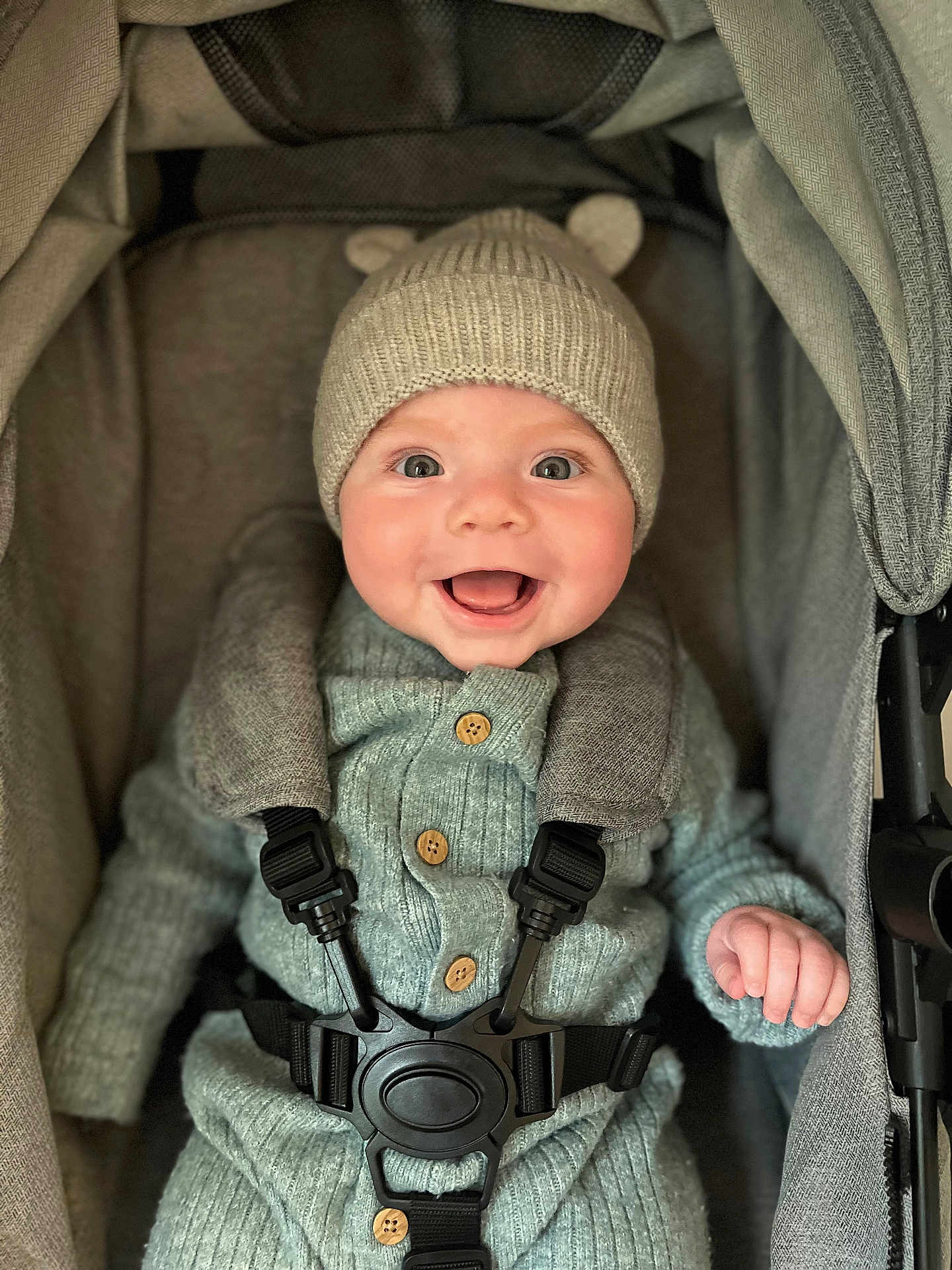 Benjamin joined the competition — help win amazing prizes! baby, smile, happy, child, hat, knitwear, buttons, stroller, seatbelt, straps, cozy, cute, infant, clothing, hand, face, eyes, headwear, fabric, warm