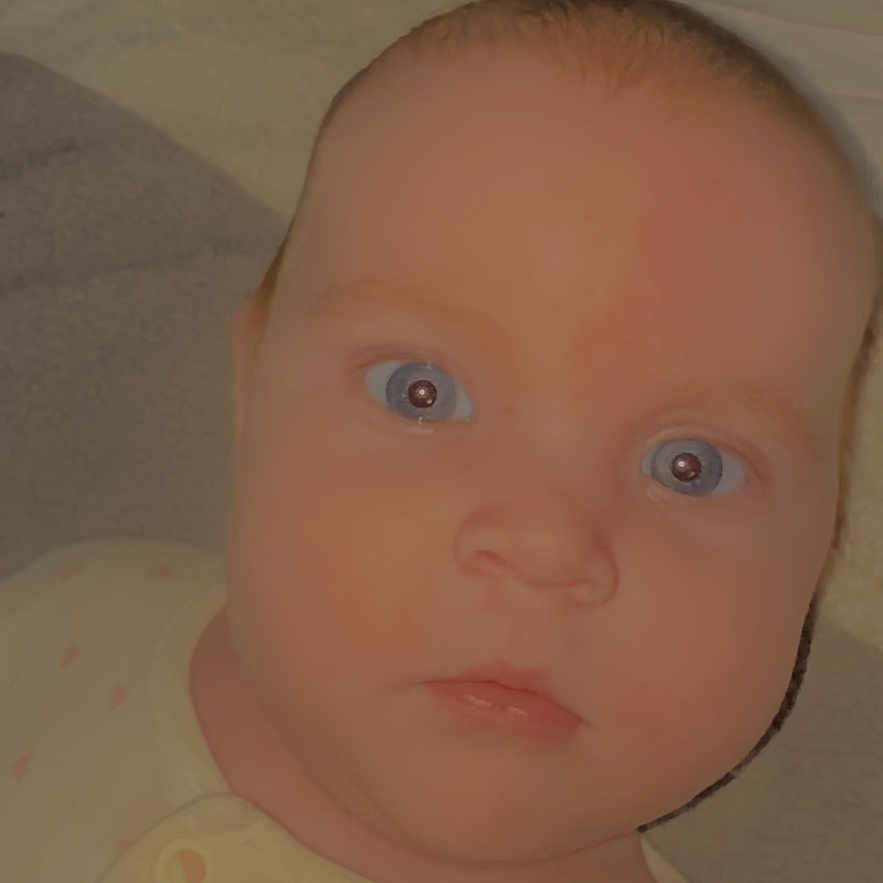 Harper is registered to the contest to win money with this photo: baby, bodypart, clothing, doll, ear, face, finger, frown, hand, happy, head, mouth, neck, newborn, person, photography, portrait, smile, toy, undershirt