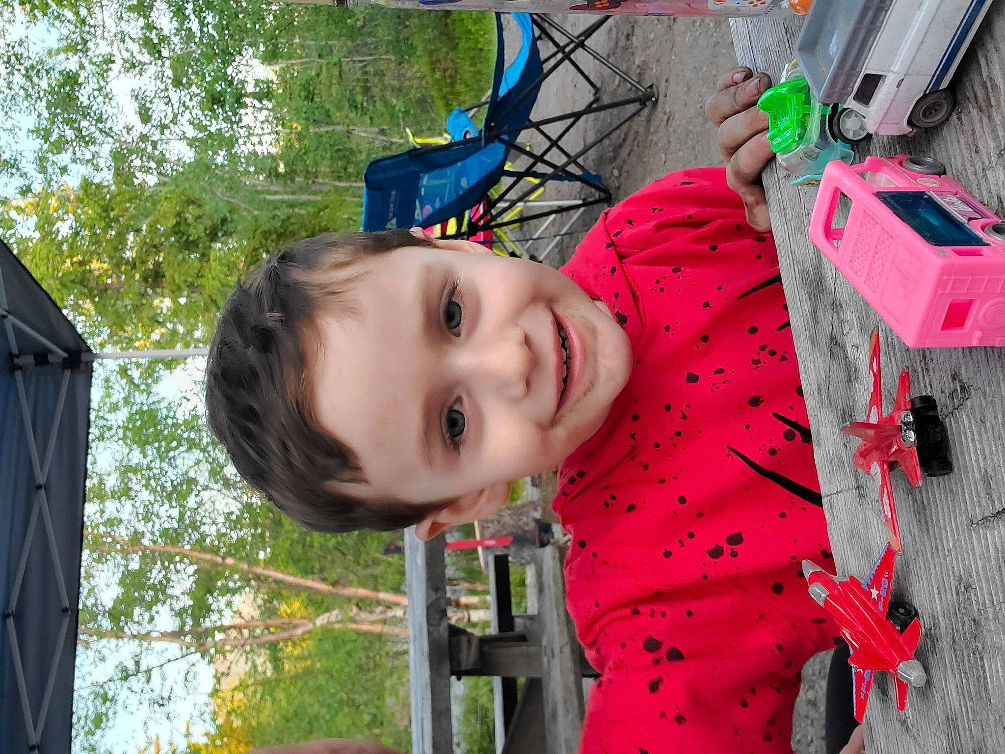 Oliver joined the competition — help win amazing prizes! bag, child, city, electric_blue, fun, grass, happy, joy, leisure, luggage_and_bags, outdoor_play_equipment, pattern, person, plant, play, public_space, recreation, smile, toddler, tree