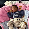 Kennedi joined the competition — help win amazing prizes! baby, sleeping, blanket, clothing, infant, soft, cute, indoors, cozy, person, footwear, socks, resting, pink, blue, white, nursery, babycare, peaceful, portrait